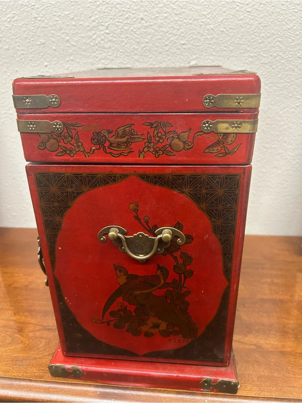 vintage Chinese-style red lacquered wooden jewelry chest ornate brass-toned